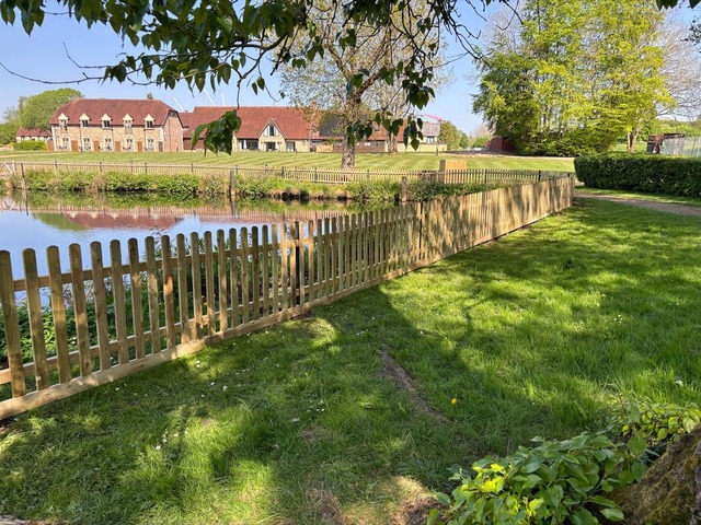 Picket fence on a lakeside